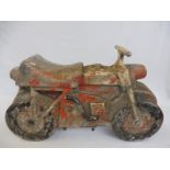 An original fairground or municipal circa 1950s aluminium childs ride motorcycle, still retaining