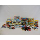 A quantity of 1990s boxed Lego, to include the Police helicopter set, and civilian sets.