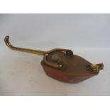An unusual copper and brass handled boat shaped hanging lamp, stamped Miller.
