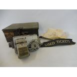 A Ticket Issue Machines (T.I.M.) Ltd of Cirencester ticket machine, in a metal case, stamped H.