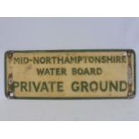 A 'Mid-Northamptonshire Water Board Private Ground' rectangular aluminium sign, 27 x 10".