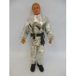 Original Action Man - a 1970s flock haired figure wearing a crash crew outfit and accessories.