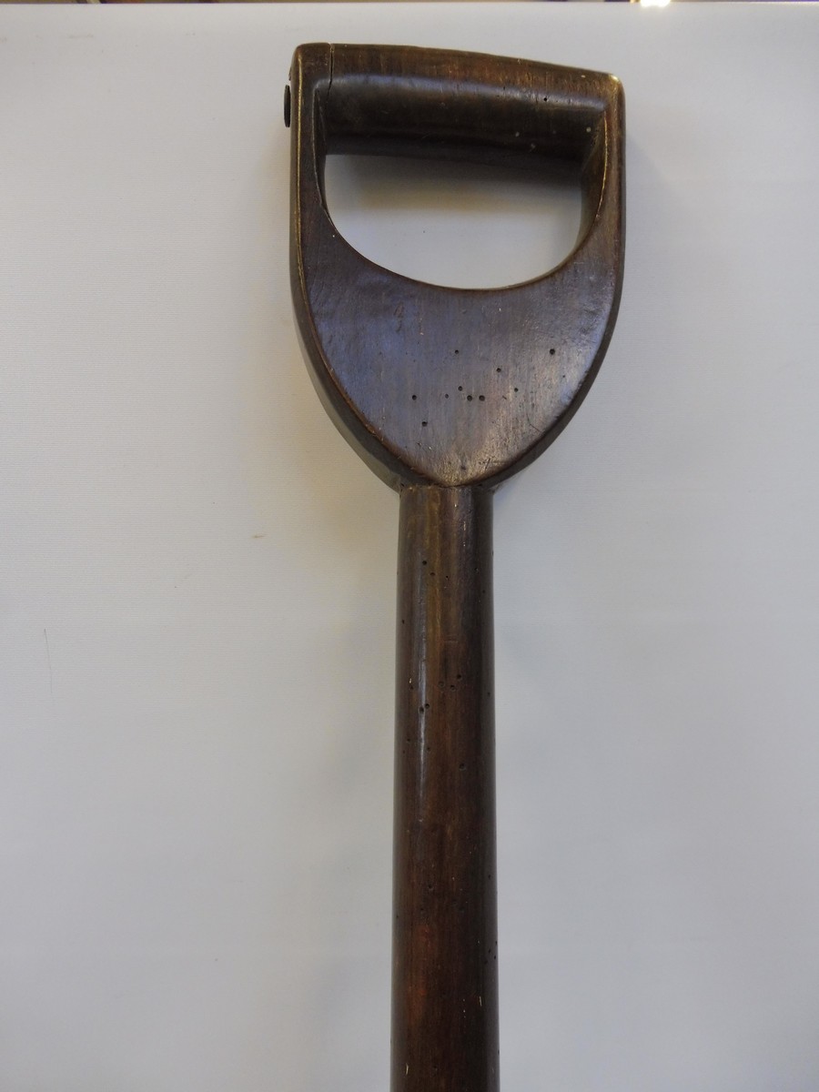 A 19th Century beech peat shovel with old iron repairs, 43 3/4" long. - Image 4 of 5