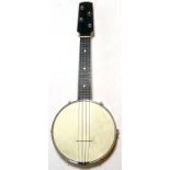 A mid-20th century ukulele banjo, unnamed. Nice clean and straight example, with low playing