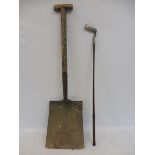 A military shovel and a hickory shafted golf club marked C.C. Anderson Seascape 'Special'.
