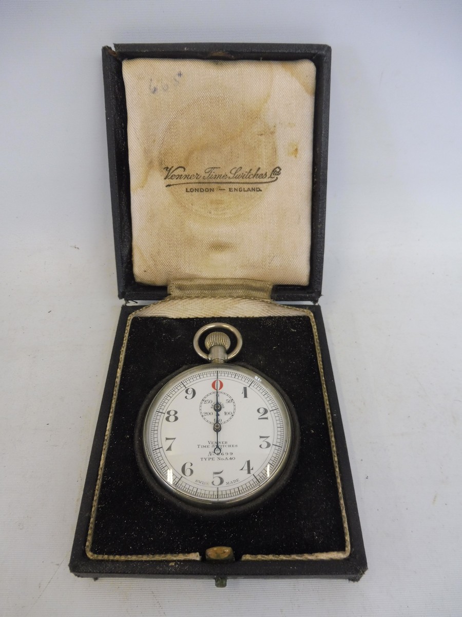 A cased Venner Time Switches Swiss stopwatch.