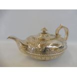 A Victorian silver teapot of half fluted design, London 1837, maker WB.