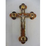 An olive wood crucifix inlaid with MOP.
