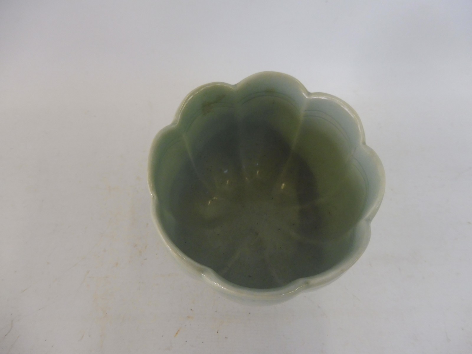 A Chinese celadon pedestal cup, 3" high. - Image 2 of 4