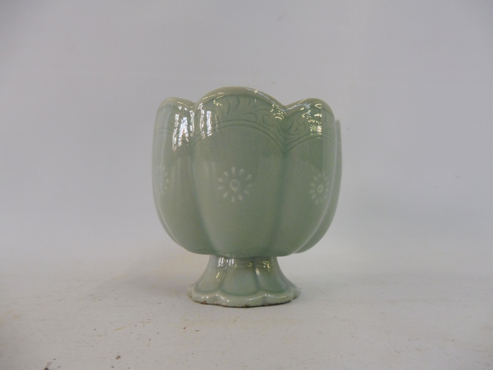 A Chinese celadon pedestal cup, 3" high. - Image 3 of 4