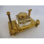 A good quality brass desktop inkwell.