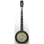 A Temlett 5 string zither banjo circa 1900. High range model. Many mother of pearl inlays to the