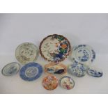 A selection of Oriental plates, saucers etc.