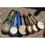 Six uke and mandolin banjos for restoration. Including Keech and JeTeL.