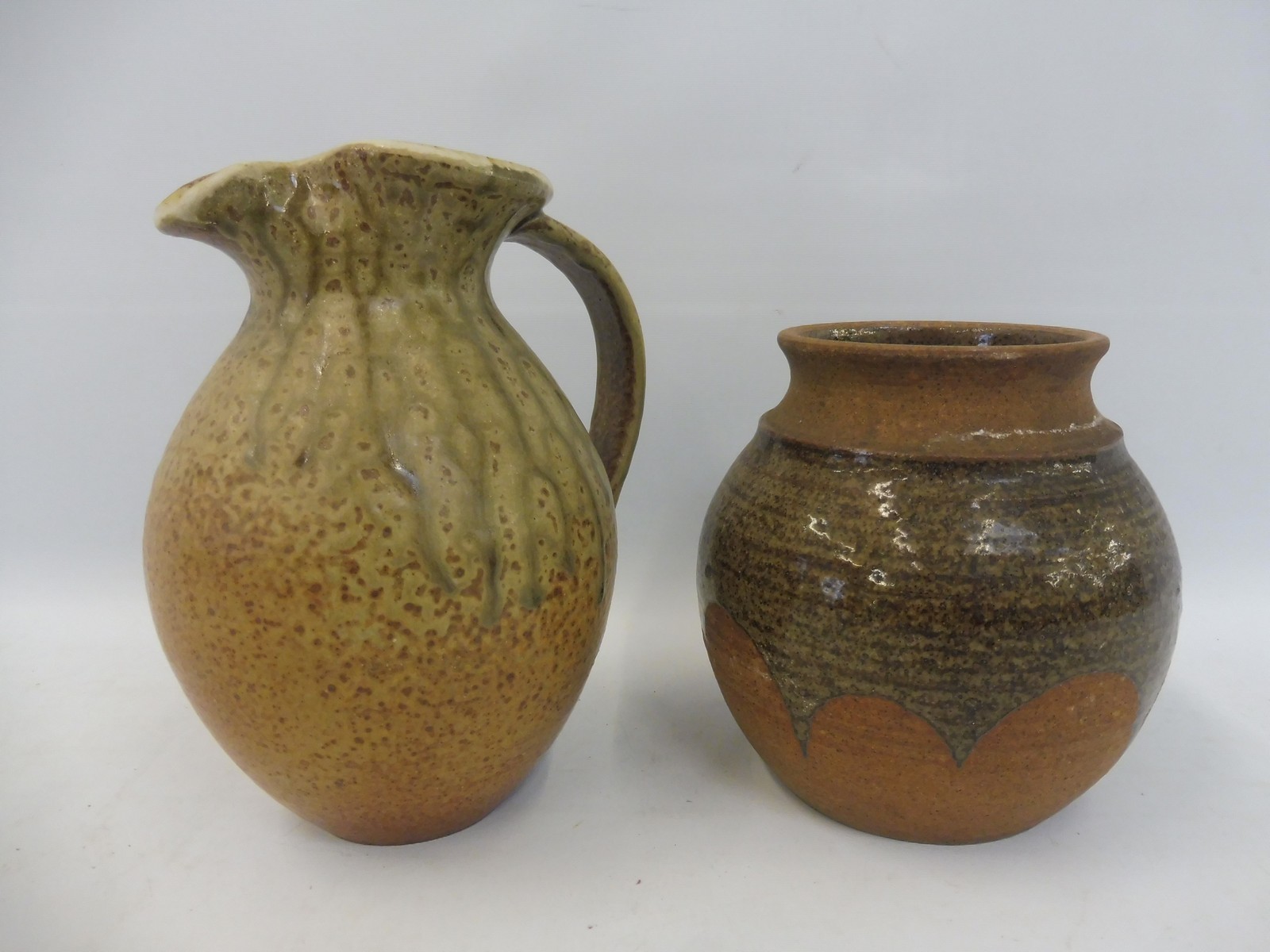 A Leach pottery vase, 5" high plus a Leach jug, 7" high, both with impressed marks.