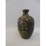 An unusual and early Chinese stoneware vase, 5" high.