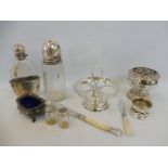 A selection of silver plated items including a hip flask.