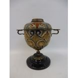 A Doulton Art Nouveau design lamp base, 9" high.