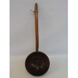 A large 19th Century Welsh turned treen fruitwood ladle.