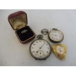 An Edwardian silver pocket watch with enamel dial, one other silver pocket watch, a cased ring etc.