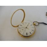 A gold pocket watch (possibly 18ct), with white enamel dial and subsidiary dial, complete with two