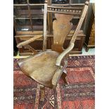 A good quality late 19th Century revolving ship's captain's chair with wide dished seat, in the