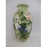 A Chinese celadon part enamel vase, 12 1/4" high.