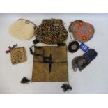 A group of lady's purses and accessories with detailed tapestry and beadwork.