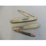 Three sterling silver and mother of pearl handled fruit knives.