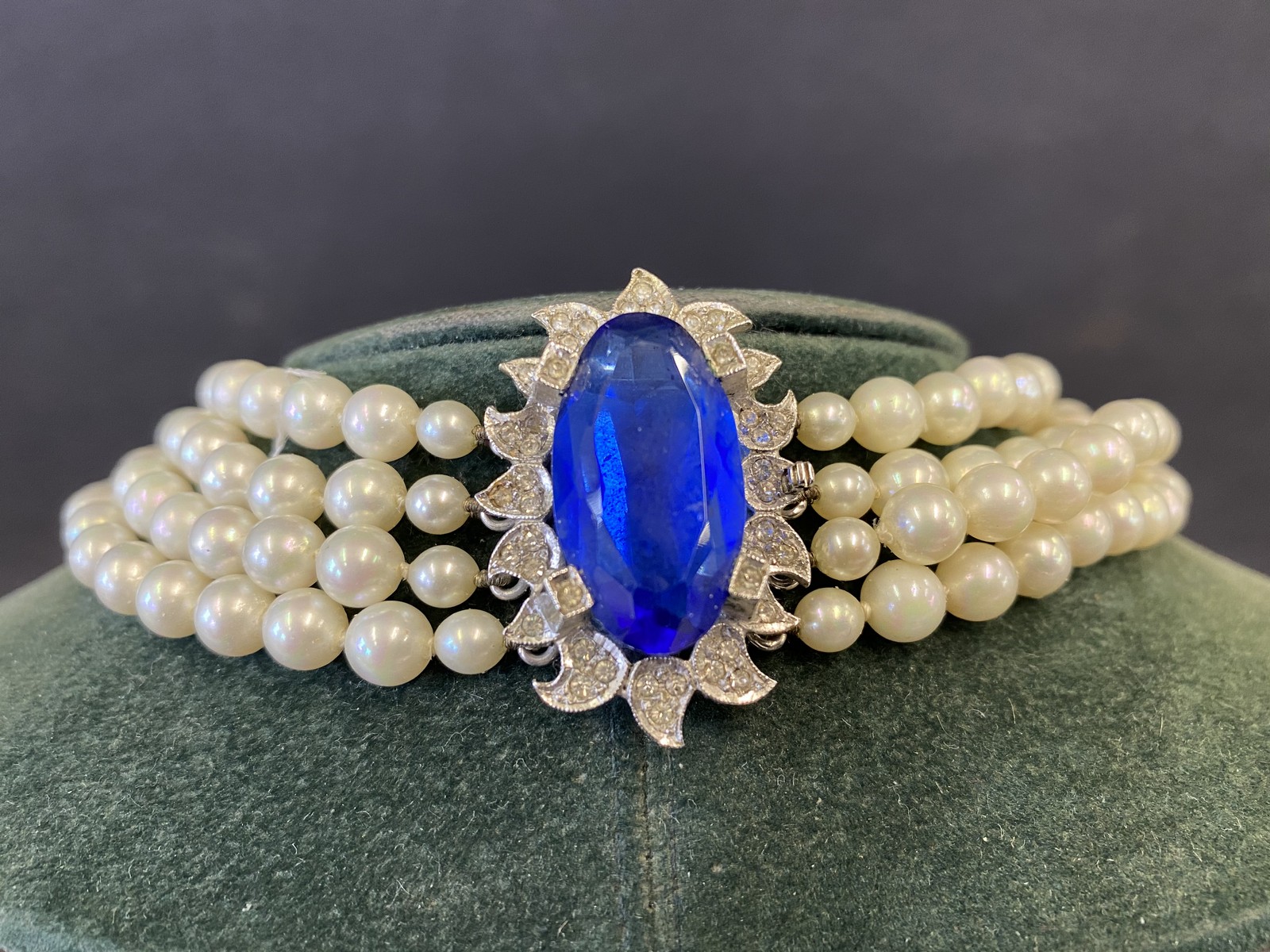 An impressive four string pearl choker with central blue stone surrounded by paste. - Image 2 of 2