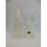 A Waterford Crystal model of a seahorse plus one of a cello.