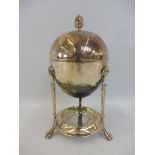 A silver plated egg coddler.