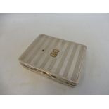 An Alfred Dunhill of London silver cigarette case bearing yellow metal (probably gold) coronet and
