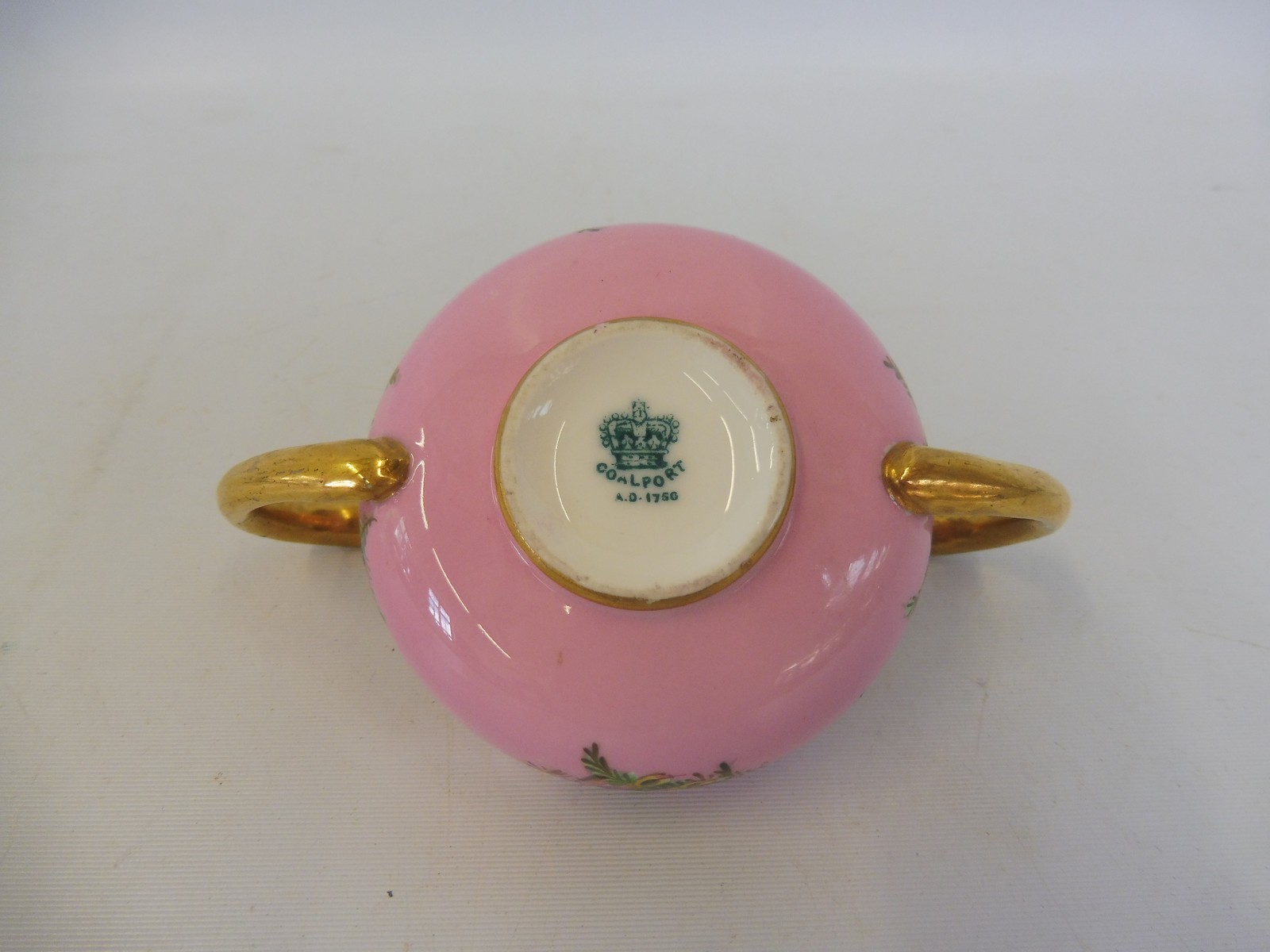 A Coalport porcelain two handled cup with gilded decoration and painted floral sprigs. - Image 4 of 4