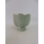 A Chinese celadon pedestal cup, 3" high.