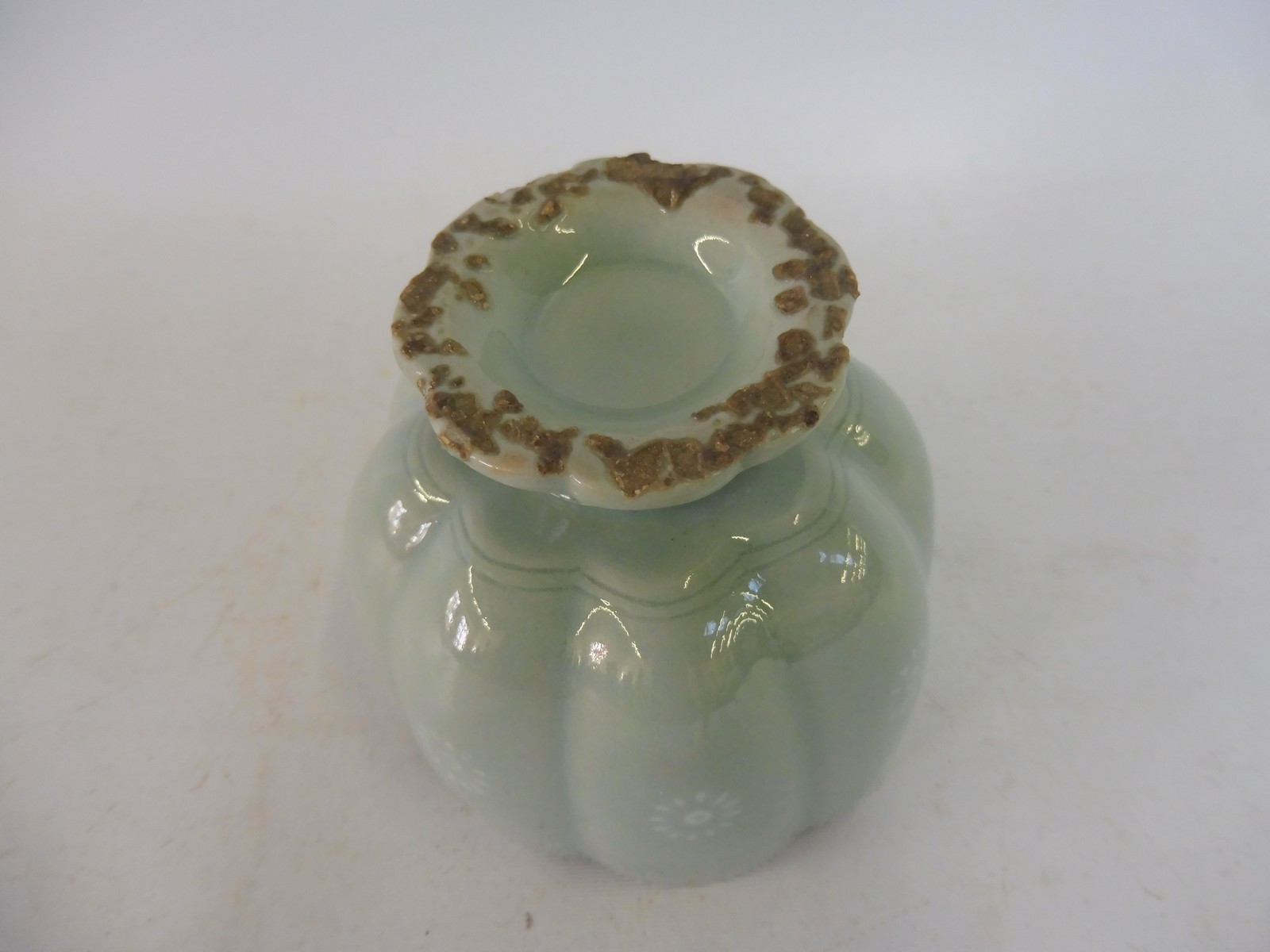 A Chinese celadon pedestal cup, 3" high. - Image 4 of 4