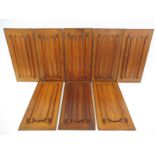 A set of eight 19th Century decorative carved oak linen fold panels, each 8 1/4 x 16 3/4".