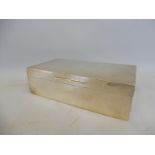 A silver rectangular cigarette box, maker rubbed.