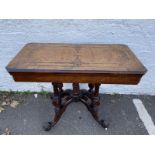 A Victorian walnut and satinwood banded fold-over card table with blue baize interior.