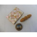 A Victorian mother of pearl card case, together with an acorn shaped needle cased and a Paris