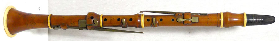 Early 19th century boxwood and ivory clarinet by D'Almaine. Eight square ended brass keys. Good