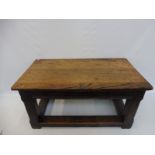 A primitive oak low table, possibly 18th Century.
