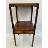 A Georgian mahogany two tier bedside table with single drawer.