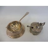 A silver half fluted lidded salt with blue glass liner, Birmingham 1876 and a silver spoon, plus a