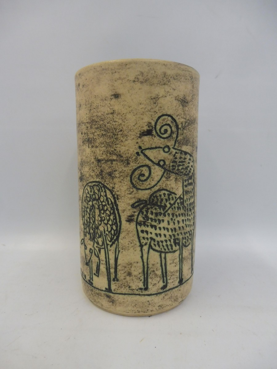 A studio pottery vase, possibly Scandinavian, with incised naive decoration of animals, signed to