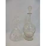 A Victorian bright cut glass claret jug plus a finely engraved decanter.