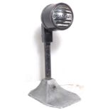 Free standing microphone marked Grampian, metal, head on a bracket and with an on/off switch