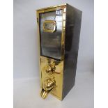 A polished steel and brass coffee bean dispenser, fully working. Provenance - formerly in