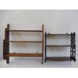 A Georgian oak wall mounted open rack and a Victorian mahogany open rack.