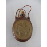An unusual stoneware flask, with decoration showing a cavalier, later leather strap.